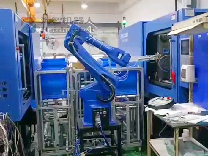 機(jī)器人自動取注塑件 機(jī)械手注塑機(jī)（一拖二自動生產(chǎn)線）(圖1)